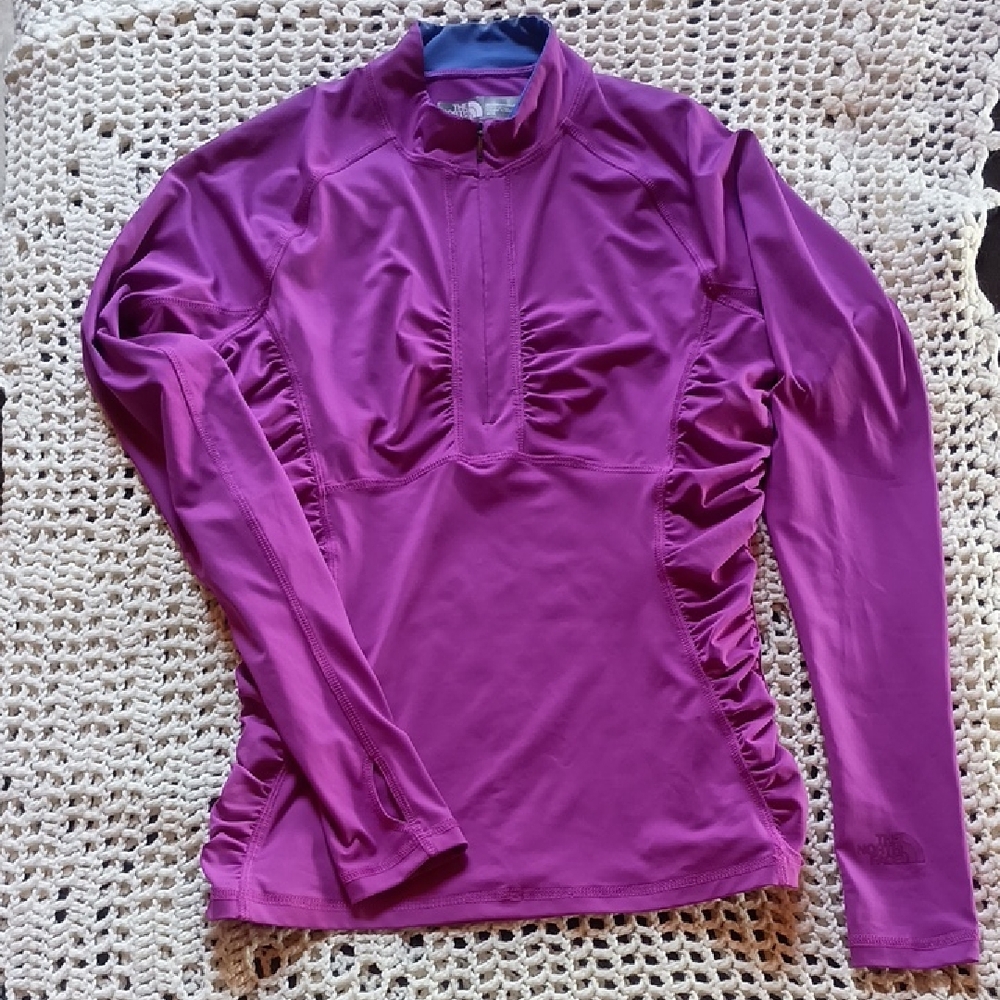 The North Face Women's Magenta Long Sleeve athletic top. Size medium.